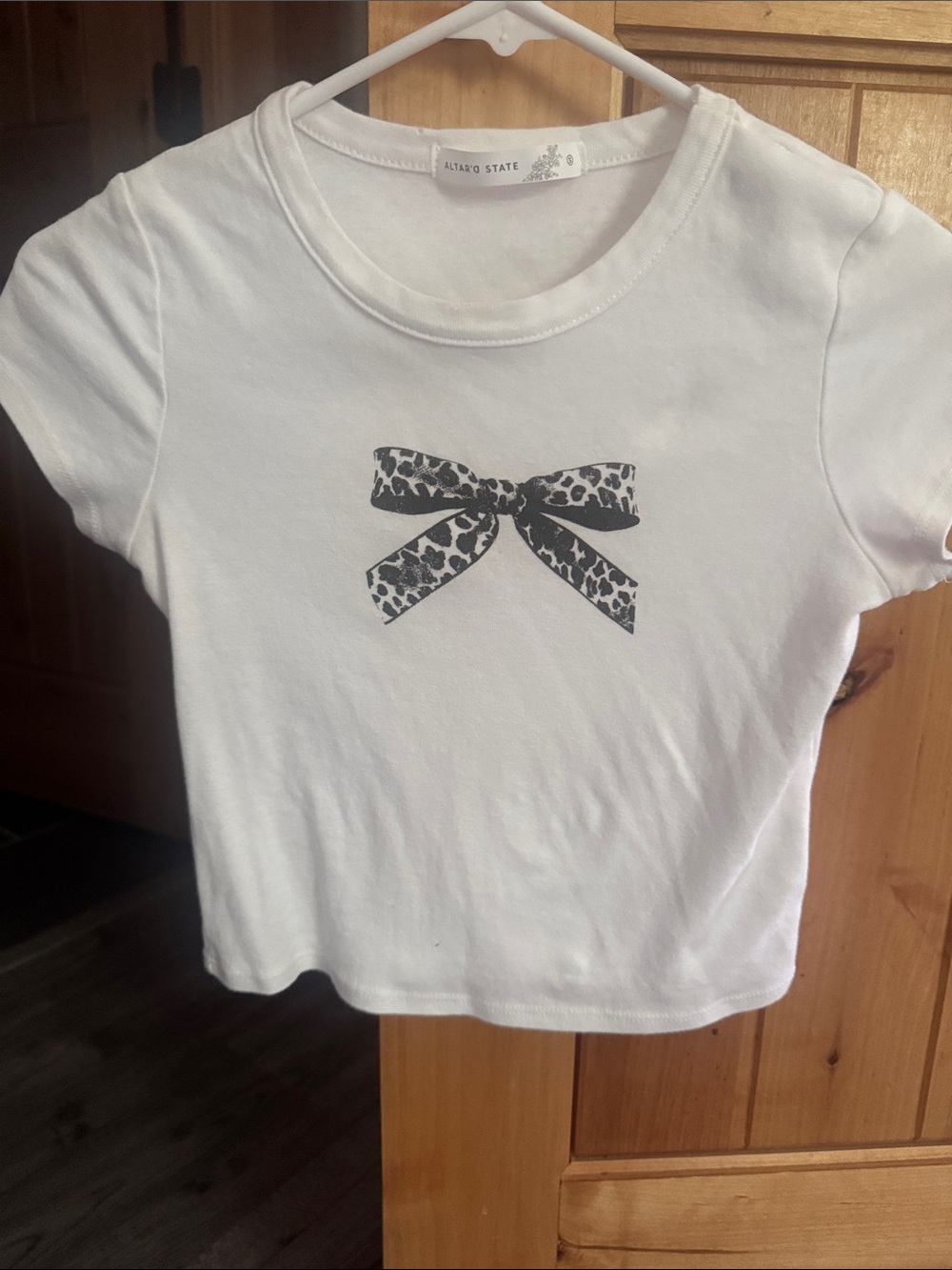 Altar'd State White Tee with Black Leopard Bow Graphic